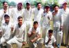 Players of Country Cricket Club posing for a group photograph after registering win at GGM Science College Hostel ground in Jammu.