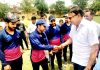 Former Minister and BJP leader Sham Lal Sharma interacting with players during inaugural ceremony of the final match at Jourian on Friday.
