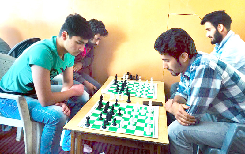 Players showing keen interest during a Chess game in Srinagar. Players showing keen interest during a Chess game in Srinagar.