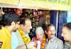 NC President Farooq Abdullah along with Devender Singh Rana at a local tea stall in Jammu on Tuesday.