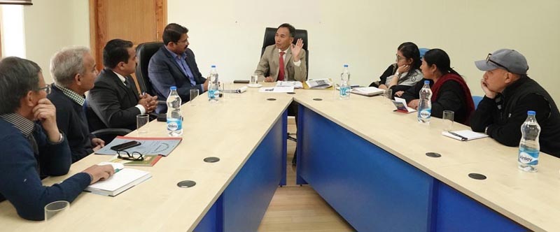 Justice Tashi Rabstan chairing a meeting of district administration at Leh on Wednesday. Justice Tashi Rabstan chairing a meeting of district administration at Leh on Wednesday.