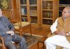 Former MP Dr Karan Singh interacting with Governor Satya Pal Malik at Srinagar on Sunday.