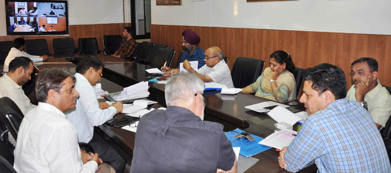 Divisional Commissioner Sanjeev Verma chairing a meeting at Jammu on Friday.