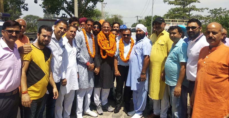 Former Deputy Chief Minister, Kavinder Gupta and MLC Vikram Randhawa kick starting black-topping of Jeevan Nagar-Darap Maralian road in Gandhi Nagar constituency on Saturday. Former Deputy Chief Minister, Kavinder Gupta and MLC Vikram Randhawa kick starting black-topping of Jeevan Nagar-Darap Maralian road in Gandhi Nagar constituency on Saturday.