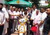 Former DyCM, Kavinder Gupta handing over a scooty to a differently abled person at Langar on Wednesday.