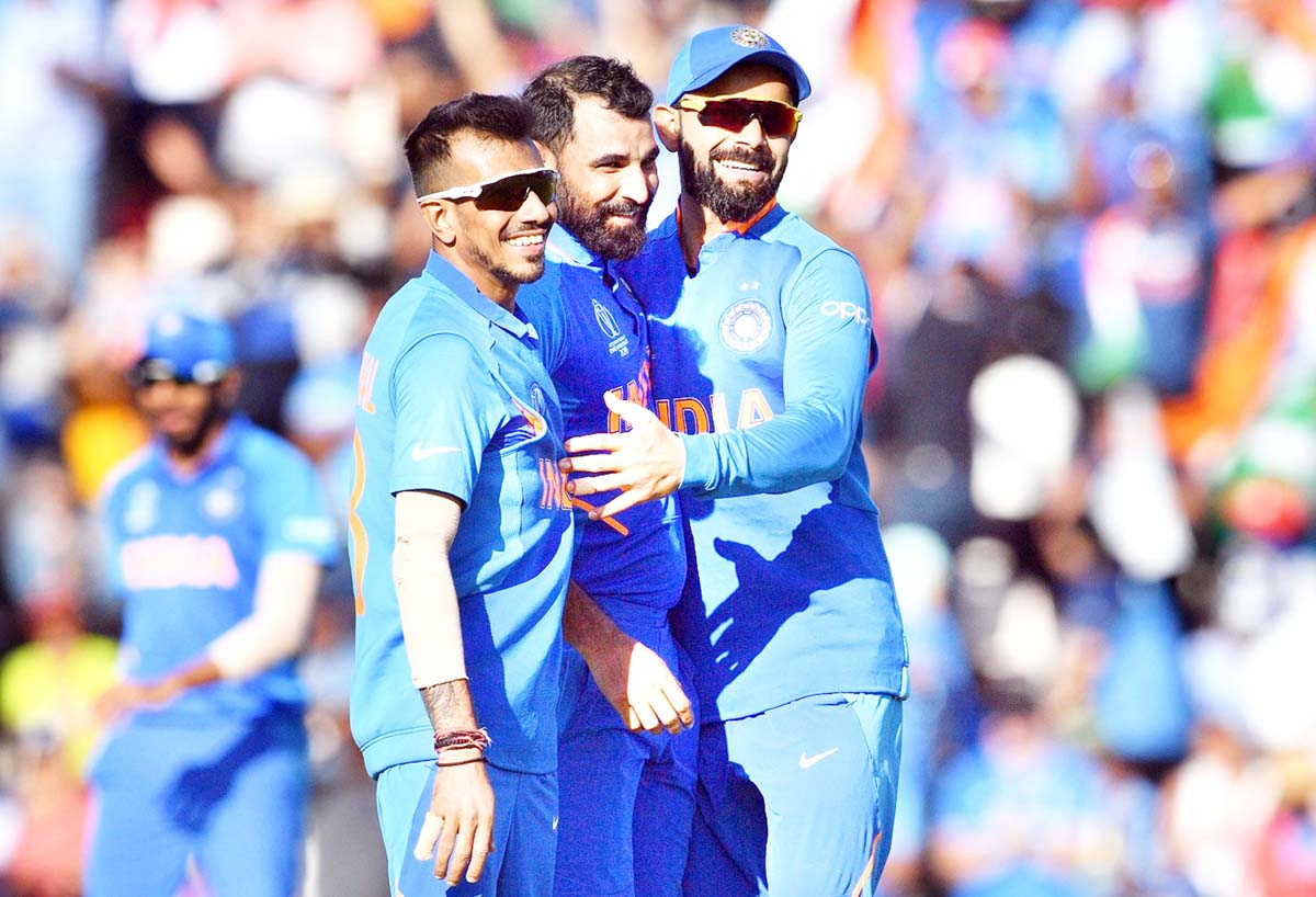 Mohammed Shami celebrates after dismissing Mohammad Nabi. Mohammed Shami celebrates after dismissing Mohammad Nabi.