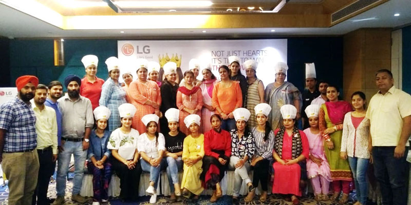 Participants of Mallika-E-Kitchen Cooking Contest and dignitaries posing for group photograph at Jammu on Saturday.