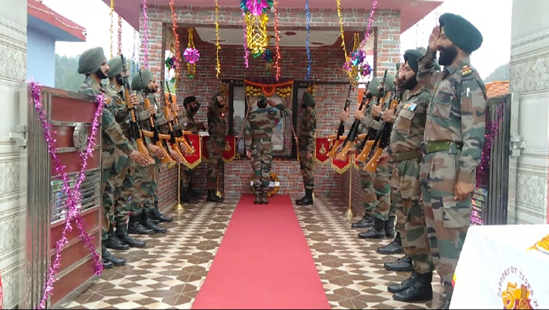 Tributes being paid to Kargil martyr during function in Nowshera on Saturday. Tributes being paid to Kargil martyr during function in Nowshera on Saturday.