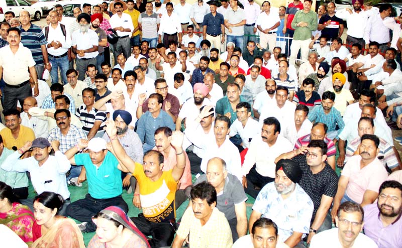 Teachers protesting in support of their demands at Exhibition Ground, Jammu on Saturday. -Excelsior/Rakesh