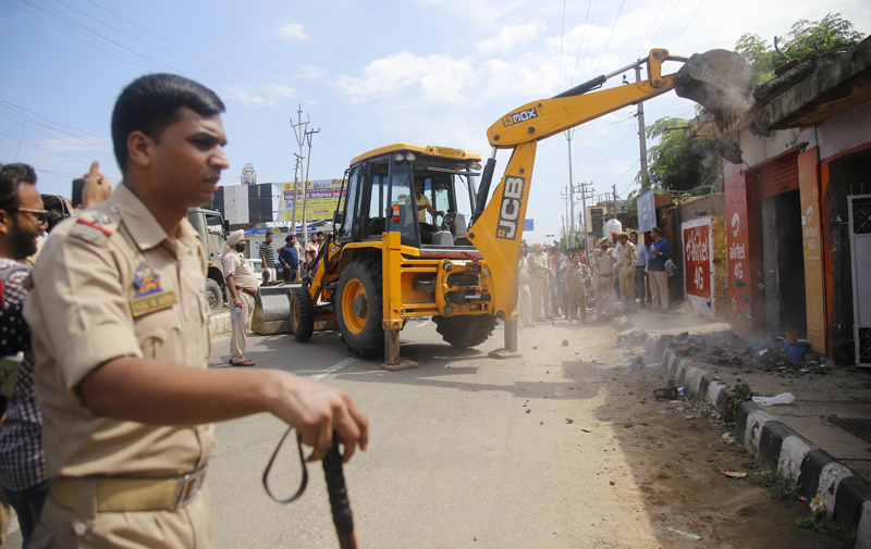 Anti-encroachment drive being carried out near Jammu Airport. — Excelsior/Rakesh Anti-encroachment drive being carried out near Jammu Airport. — Excelsior/Rakesh