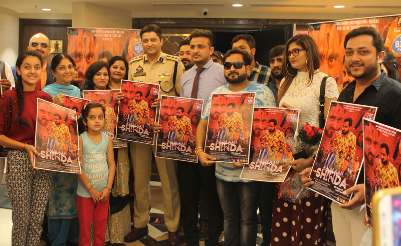 SSP Operations Jammu, Sandeep Mehta along with team of film ‘Aaun Aan Shinda’ releasing poster of the film. -Excelsior/Rakesh