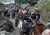 Shri Amarnath yatris heading towards cave shrine. — Excelsior/Sajjad Dar