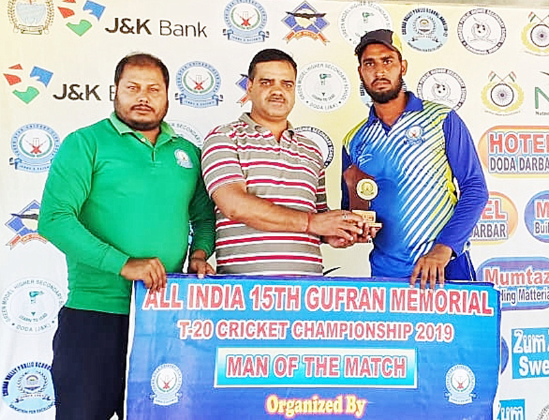 Winner receiving man of the match award in Gufran T20 at Sports Stadium in Doda.