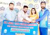 Winner receiving man of the match award during Gufran Memorial T20 Cricket Tournament at Doda.