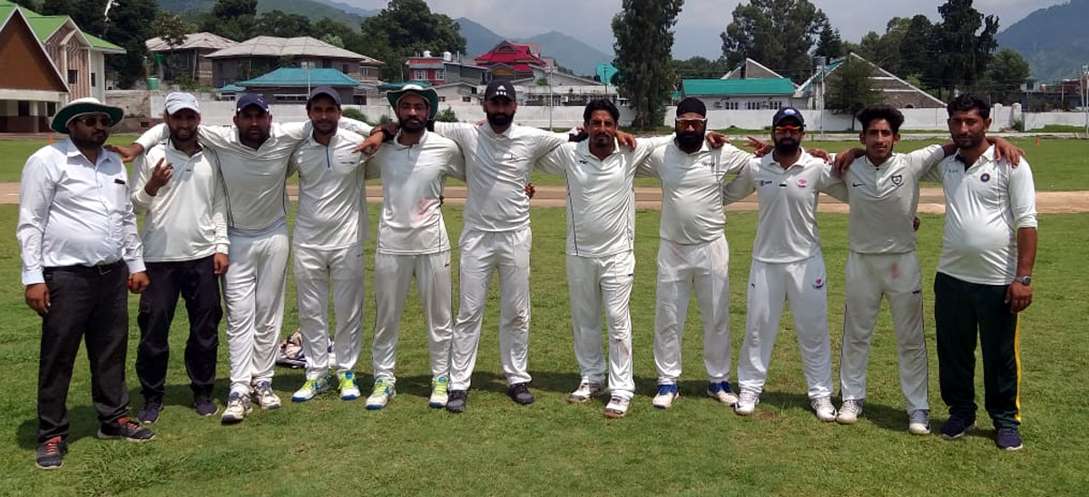 Winners posing for a group photograph during a match of JKCA Tournament at Poonch on Monday. Winners posing for a group photograph during a match of JKCA Tournament at Poonch on Monday.