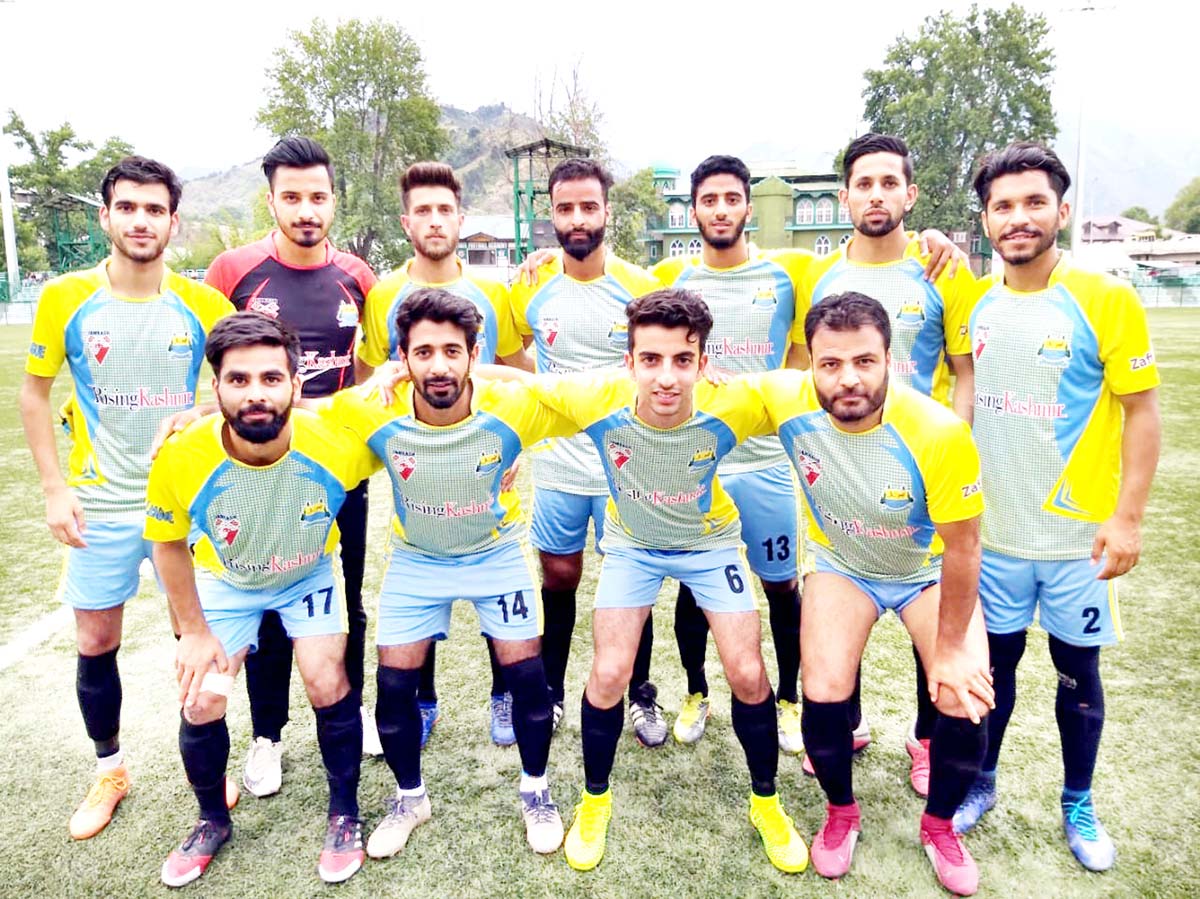 Footballers posing for a group photograph in Srinagar. Footballers posing for a group photograph in Srinagar.