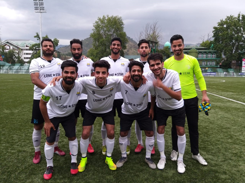 J&K Police team posing for a group photograph at TRC ground in Srinagar. J&K Police team posing for a group photograph at TRC ground in Srinagar.