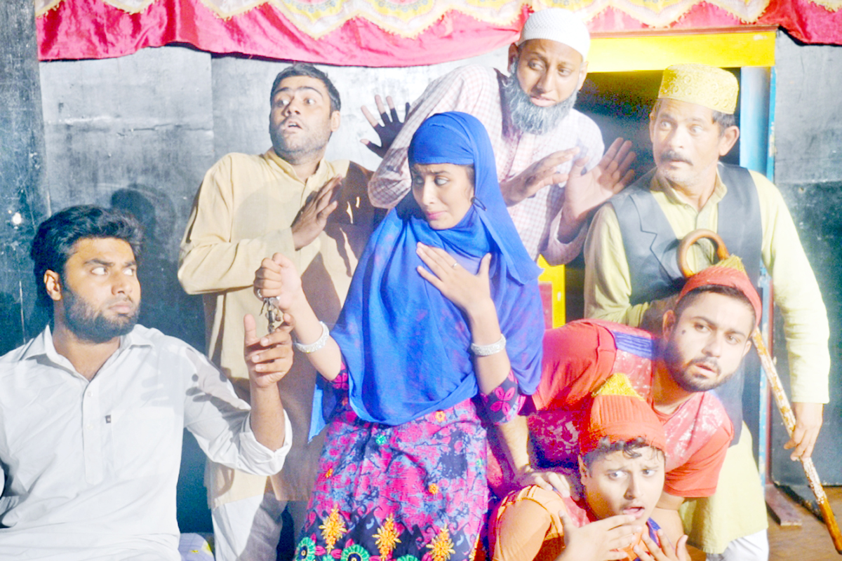 A scene from Urdu play ‘Jhootha Khwaab’ staged by Natrang at Jammu on Sunday. A scene from Urdu play ‘Jhootha Khwaab’ staged by Natrang at Jammu on Sunday.
