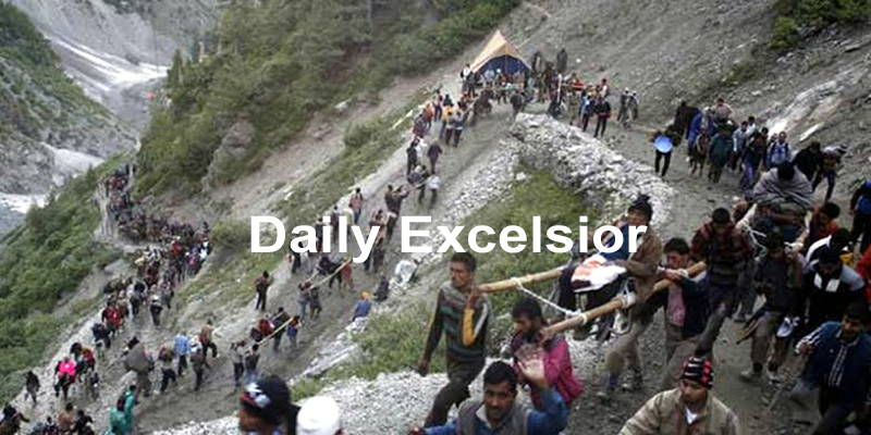 Amarnath yatris heading towards holy cave. -Excelsior/Sajjad Dar
