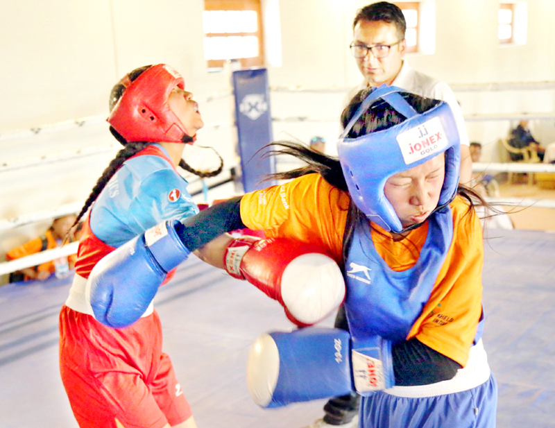 Boxers in action during Day-2 of Ladakh School Olympics in Leh on Thursday.