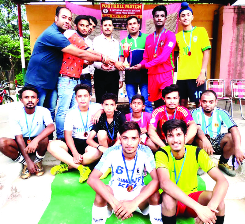 Players of Christian United Club posing for a group photograph after registering win in Football. Players of Christian United Club posing for a group photograph after registering win in Football.
