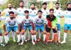 Winners posing for a group photograph during JKFA Annual League Football Tournament in Srinagar.