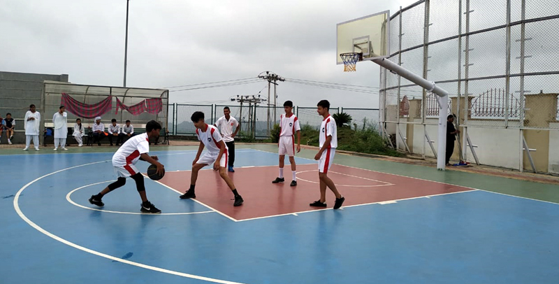 Players in action during a Basketball match of Inter-School Tournament of district Reasi.