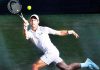 Novak Djokovic of Serbia hits a return during the men’s singles second round match with Denis Kudla of the United States at the 2019 Wimbledon Tennis Championships in London.