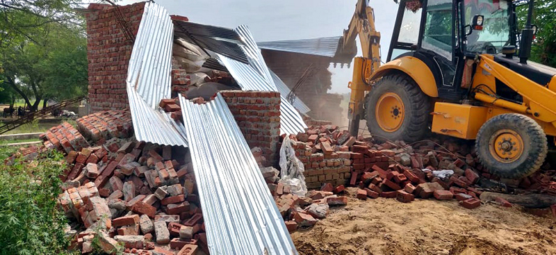 Illegal structures being demolished in Samba on Sunday. Illegal structures being demolished in Samba on Sunday.