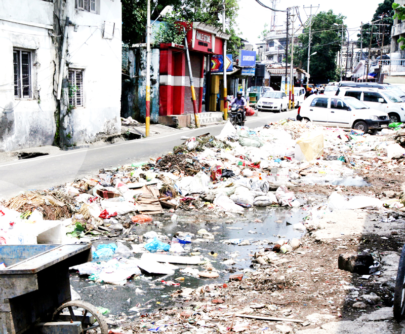 Garbage scattered on the road in front of Parade dumping yard in Jammu City. -Excelsior/Rakesh Garbage scattered on the road in front of Parade dumping yard in Jammu City. -Excelsior/Rakesh