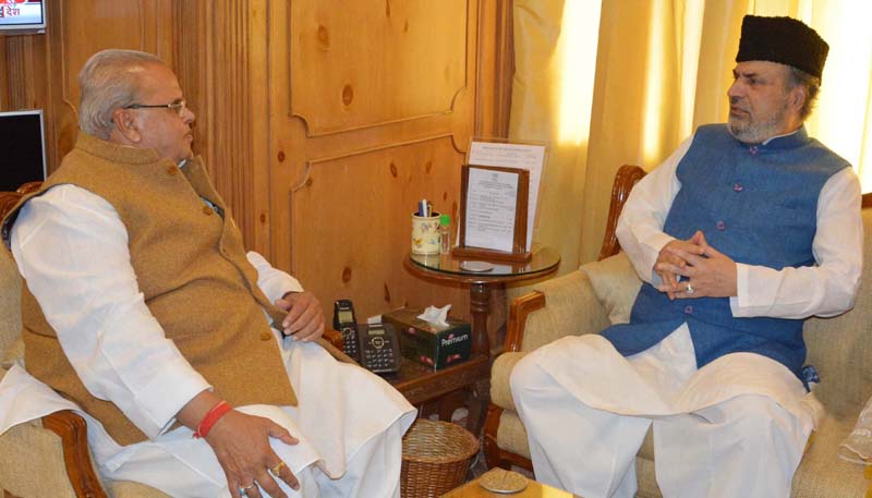 Governor Satya Pal Malik meeting with former MP Muzaffar Hussain Baig on Wednesday.