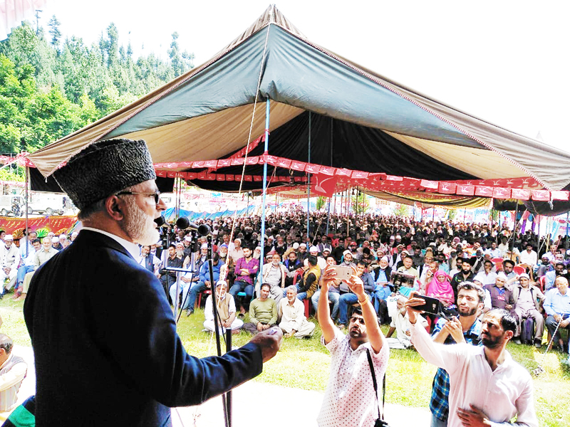 Senior NC leader Ali Mohd Sagar addressing public meeting at Kupwara on Sunday.