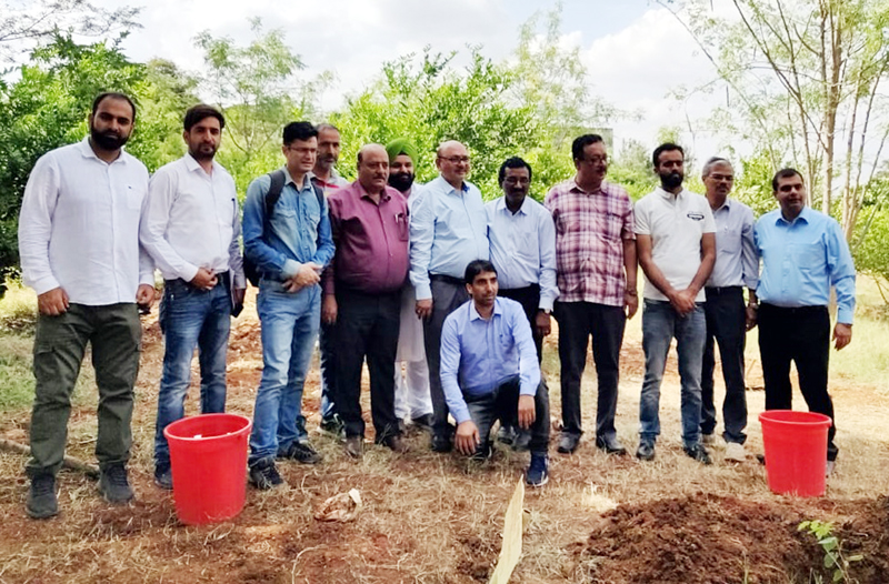 Advisor K Skandan posing with delegation at Tanflora Infrastructure Park in Tamil Nadu. Advisor K Skandan posing with delegation at Tanflora Infrastructure Park in Tamil Nadu.