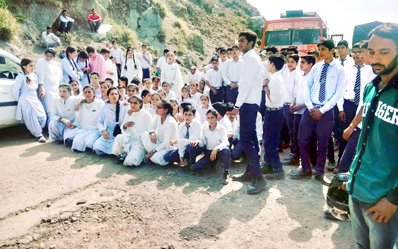 Students blocking Ramnagar-Basantgarh road on Wednesday. Students blocking Ramnagar-Basantgarh road on Wednesday.