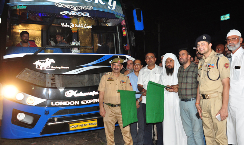 DC Jammu Ramesh Kumar flagging off Hajj pilgrims on Saturday. DC Jammu Ramesh Kumar flagging off Hajj pilgrims on Saturday.