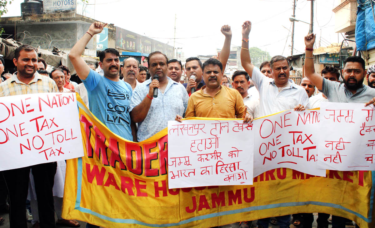 Traders of Ware House, Nehru Market staging protest against Lakhanpur Toll Tax. -Excelsior/Rakesh