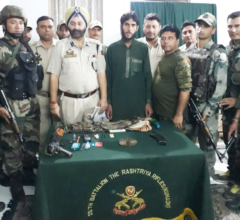 Arrested militant in custody of Army and police in Doda on Wednesday.