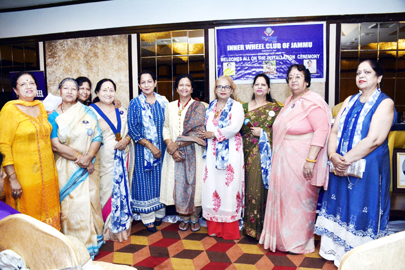 Newly installed President of International Inner Wheel Club of Jammu, Reva Raina along with others posing for a photograph.