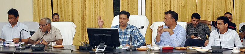 Divisional Commissioner Jammu Sanjeev Verma chairing a meeting at Ramban on Friday. Divisional Commissioner Jammu Sanjeev Verma chairing a meeting at Ramban on Friday.