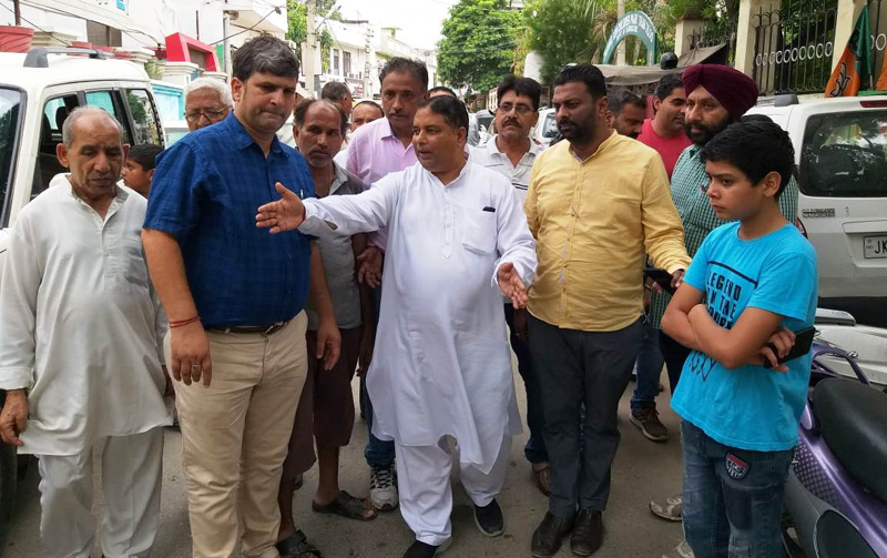 Former Minister, Sat Sharma inspecting condition of roads and lanes in JMC Ward No 30. Former Minister, Sat Sharma inspecting condition of roads and lanes in JMC Ward No 30.