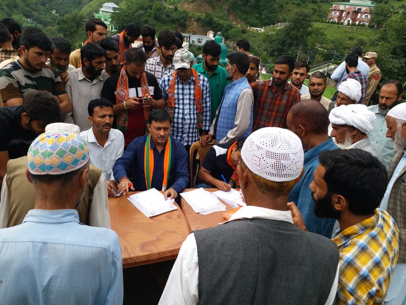 Senior BJP leader Vibodh Gupta during a membership drive at Rajouri. Senior BJP leader Vibodh Gupta during a membership drive at Rajouri.
