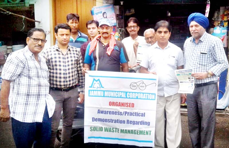 JMC members holding practical demonstration over Solid Waste Management. JMC members holding practical demonstration over Solid Waste Management.