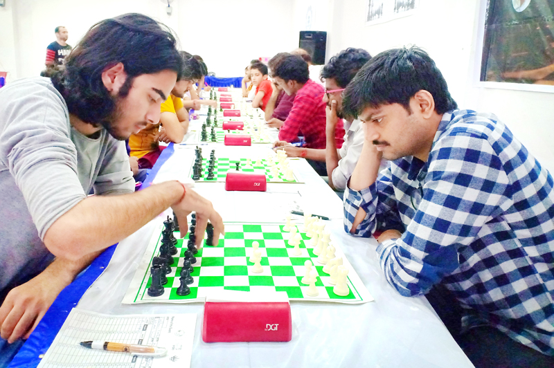 Players in action during Jaiveer Singh FIDE Rating Chess Tournament in Jammu. Players in action during Jaiveer Singh FIDE Rating Chess Tournament in Jammu.