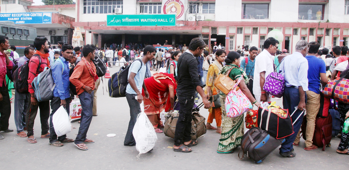 People in a queue at Jammu Railway Station on Wednesday. -Excelsior/Rakesh People in a queue at Jammu Railway Station on Wednesday. -Excelsior/Rakesh