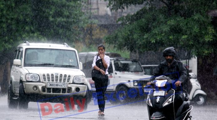 Rains lash Jammu on Friday morning. -Excelsior/Rakesh
