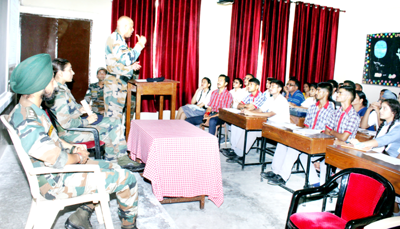 Army officer expressing his views during career fair. Army officer expressing his views during career fair.