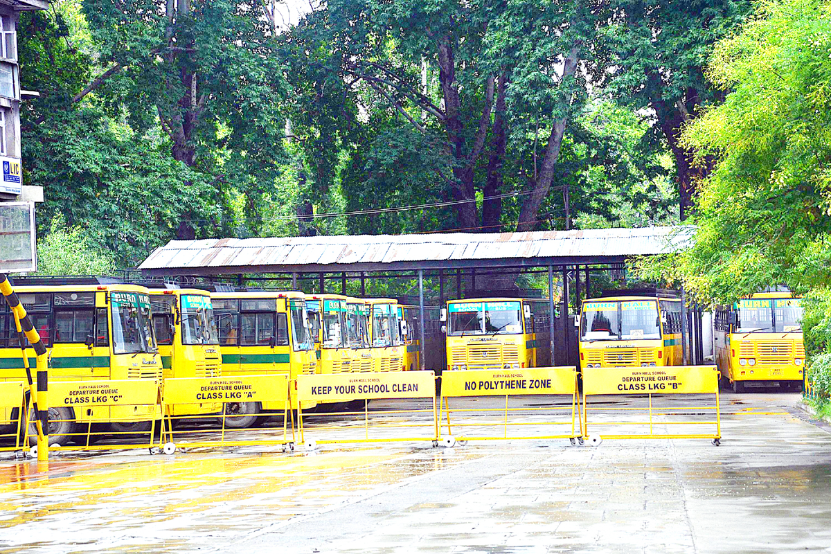 Buses parked in the premises of a school building in Srinagar on Monday. -Excelsior/Shakeel Buses parked in the premises of a school building in Srinagar on Monday. -Excelsior/Shakeel