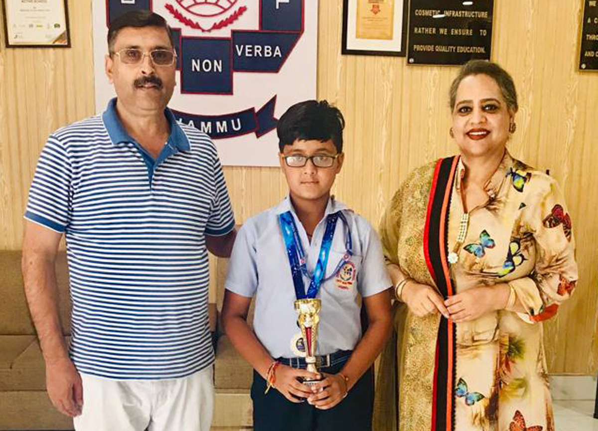 Karateka Vansh Khullar posing along with Management of Doon International School. Karateka Vansh Khullar posing along with Management of Doon International School.
