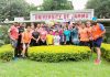 Runners posing for a group photograph after completing 1st Promo Run for 2nd Edition of Jammu Half Marathon at JU in Jammu.
