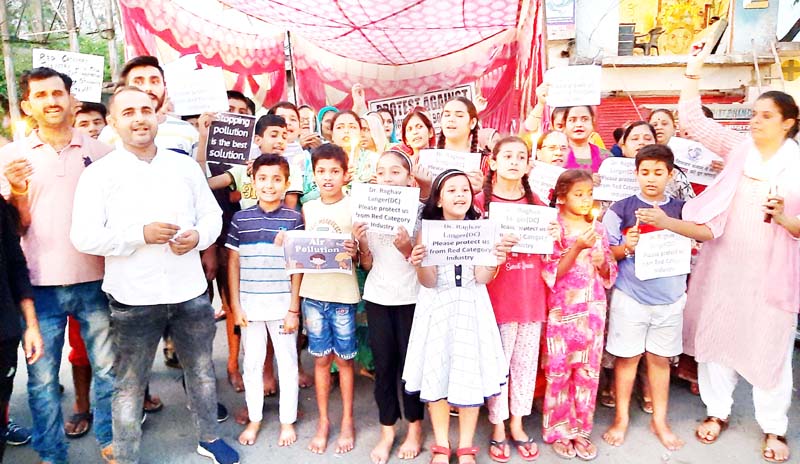 Children taking out candle light procession in Kathua on Friday. -Excelsior/Pardeep